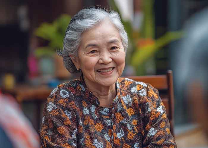 Senior Asian lady smiling